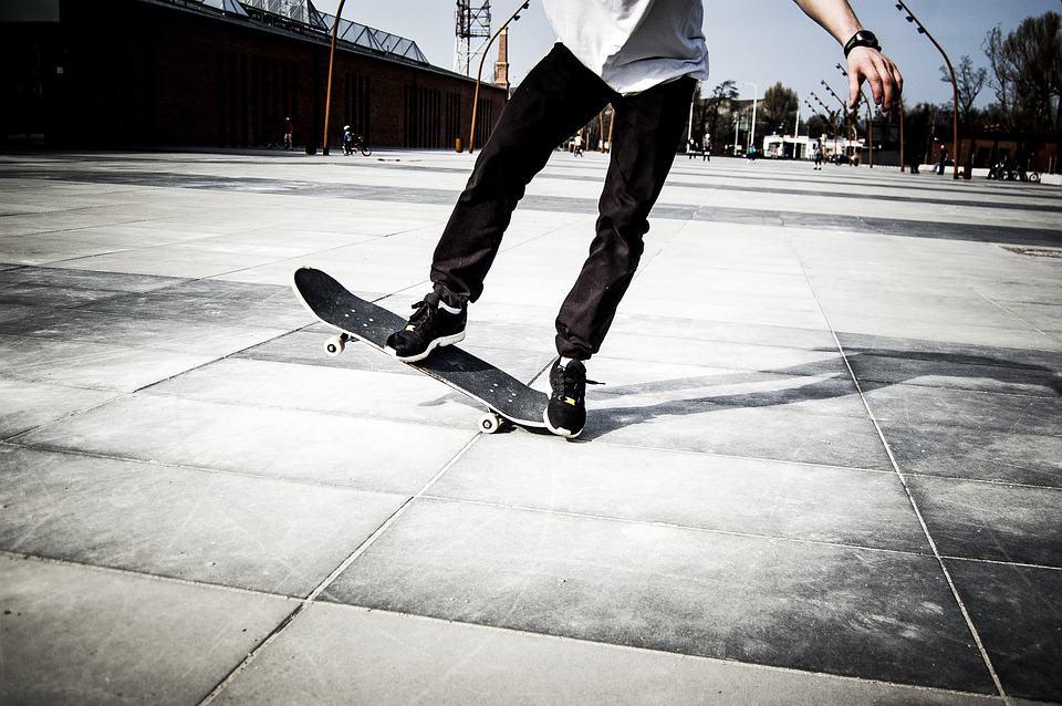 man and skateboard