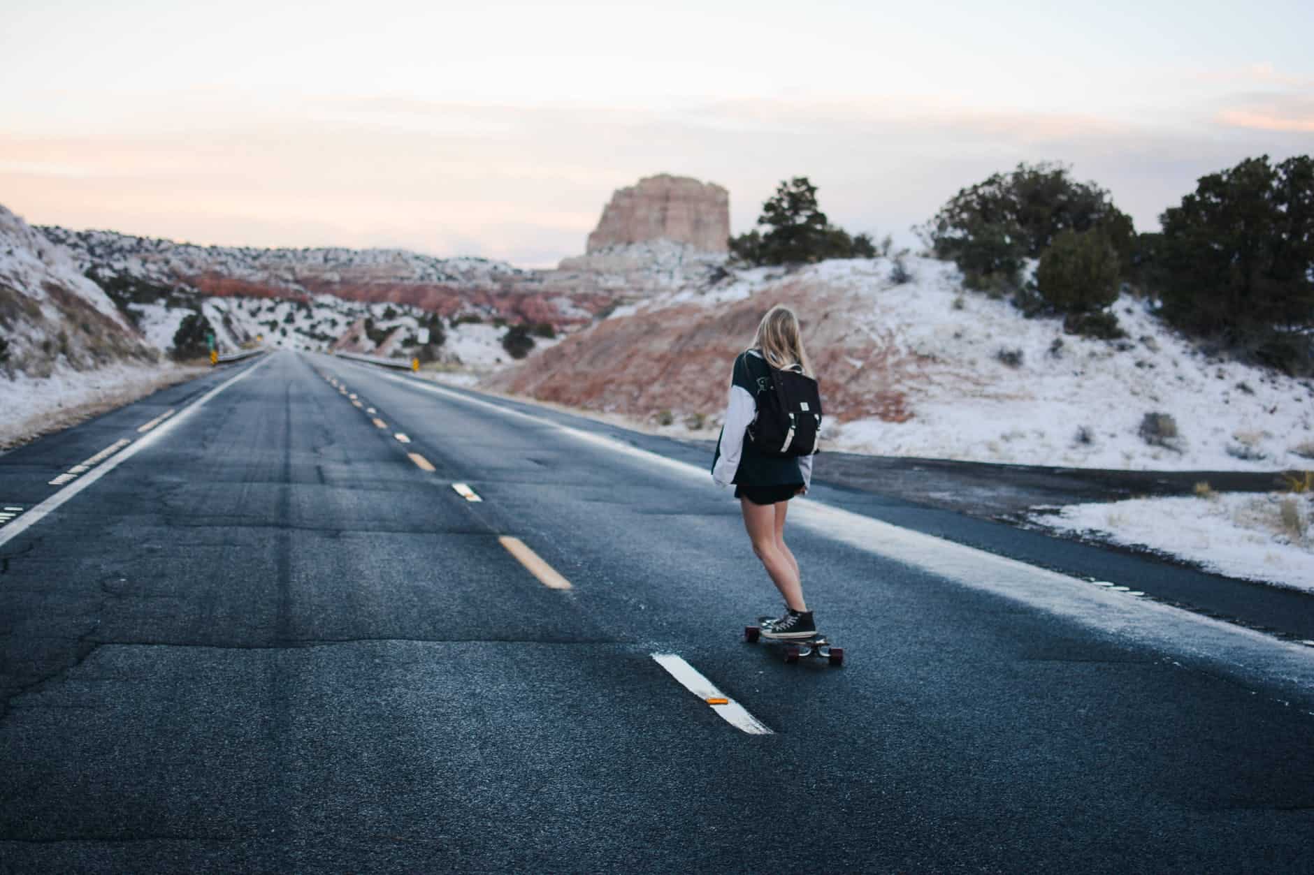 a girl with her longboard