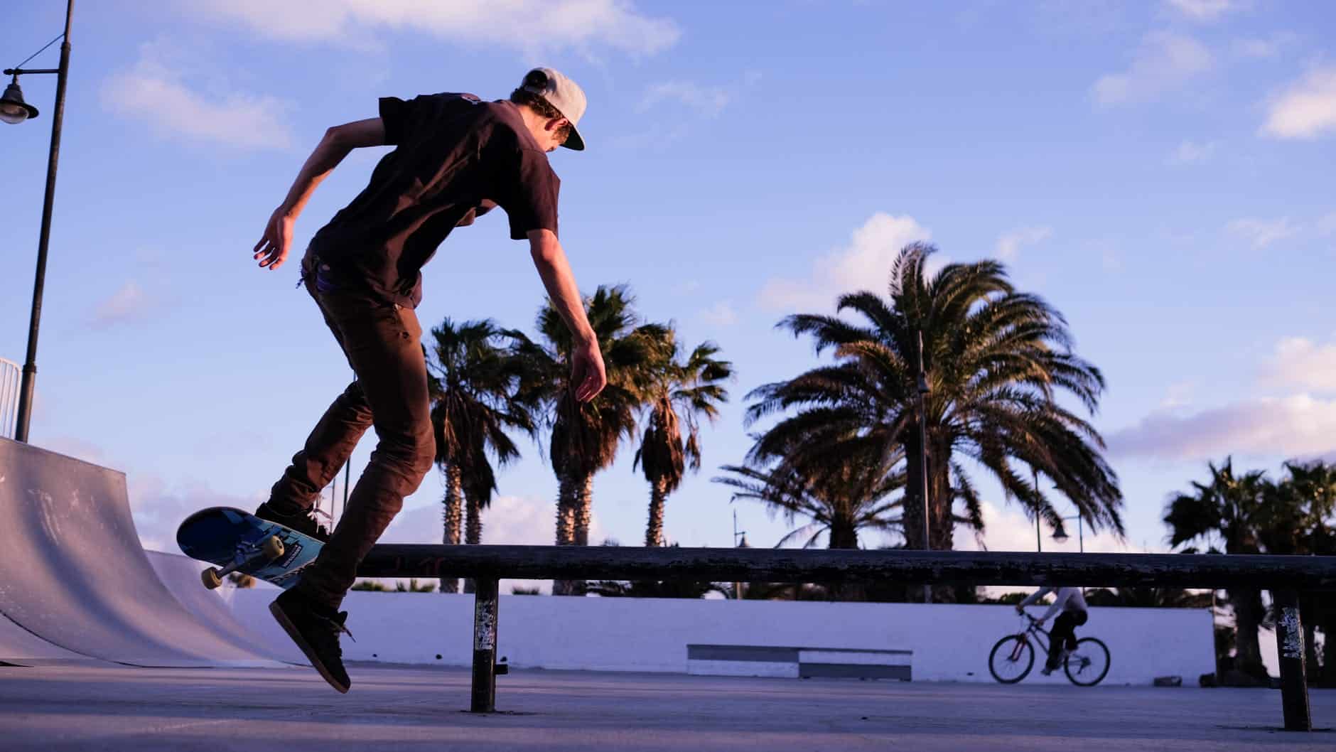 man doing some longboard tricks